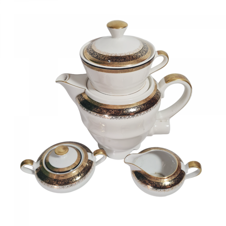 Набор для чая винтажный Neuerer KG / Germany US Zone (Bavaria) с черно-золотым орнаментом - заварочный чайник с электровилкой, молочник и сахарница, фарфор, Германия, 1946-49гг. Набор для чая винтажный Neuerer KG / Germany US Zone (Bavaria) с черно-золотым орнаментом - заварочный чайник с электровилкой, молочник и сахарница, фарфор, Германия, 1946-49гг.